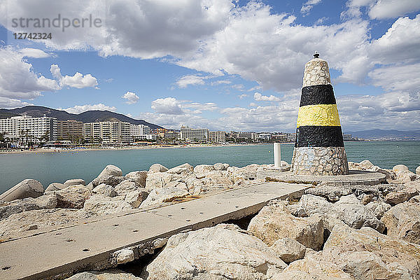 Spain  Andalusia  Torremolinos  Costa del Sol  coast with navigation mark