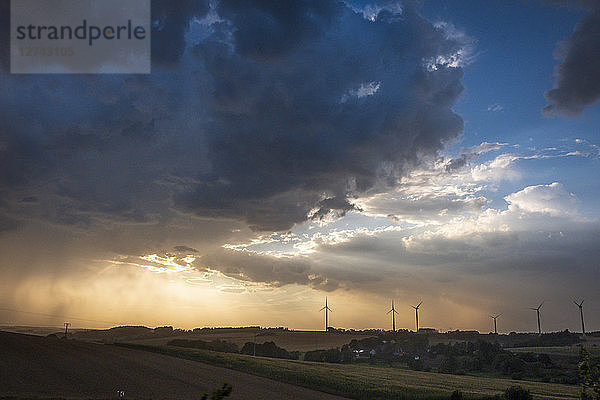 Germany  Lausitz  wind wheels and thundercloud