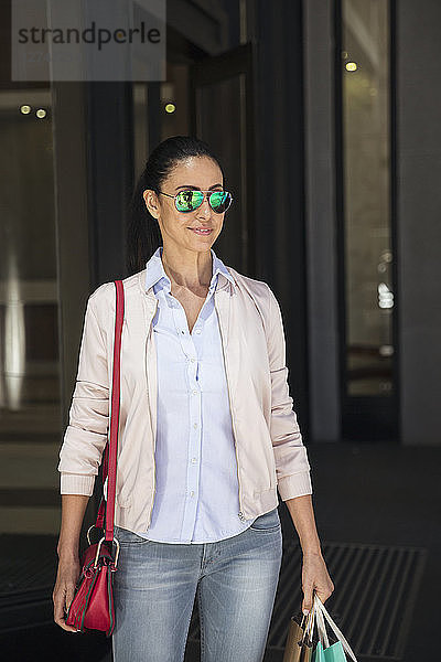 Mature woman on a shopping spree