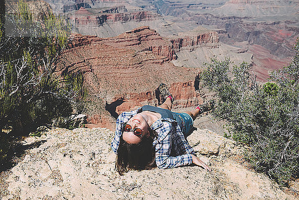 USA  Arizona  Grand Canyon National Park  happy woman at Grand Canyon