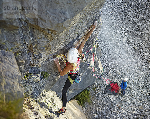 Austria  Innsbruck  Martinswand  woman climbing in rock wall
