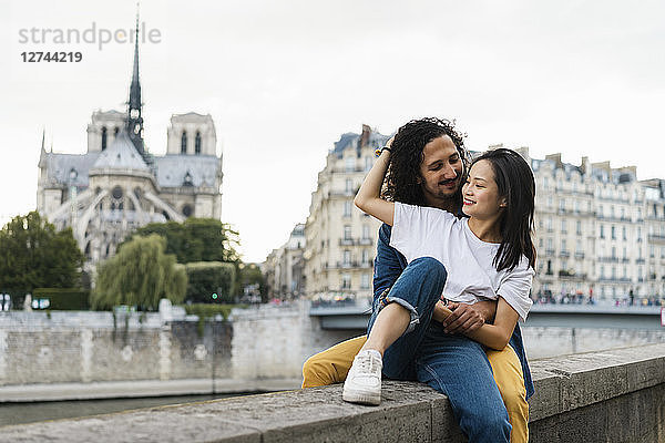 France  Paris  happy young couple at river Seine