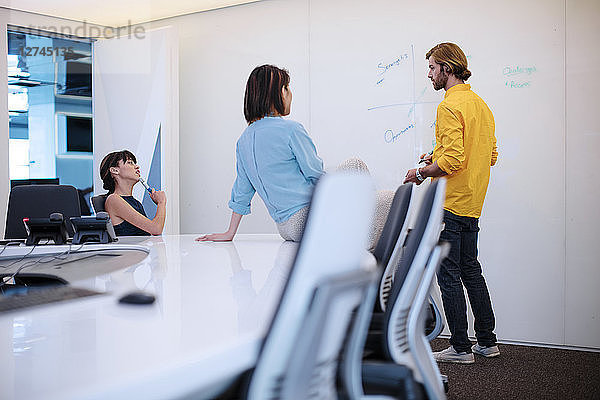 Business people having a meeting in office  brainstorming