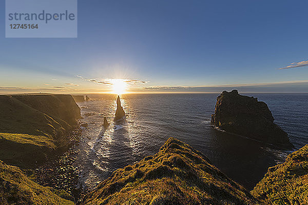 UK  Scotland  Caithness  Coast of Duncansby Head  Duncansby Stacks at sunrise