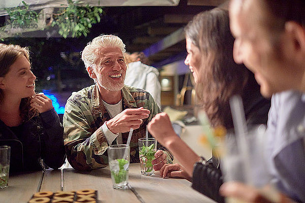 Friends drinking on patio