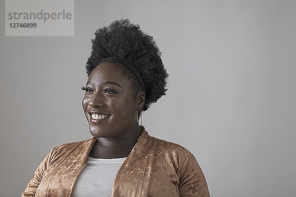 Portrait smiling  confident woman looking away