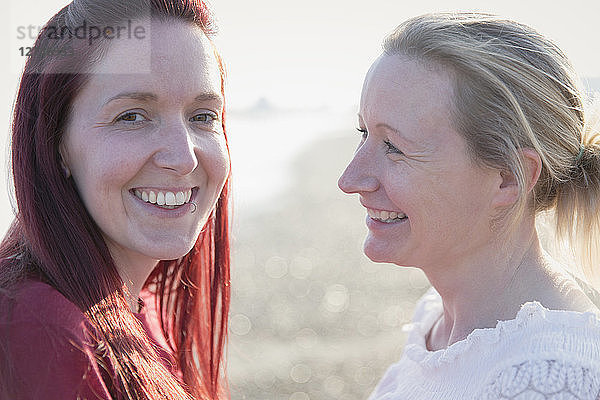 Portrait smiling lesbian couple