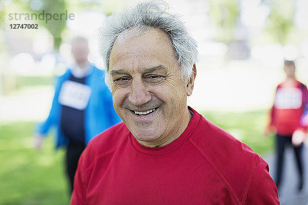 Portrait smiling  confident senior man in park