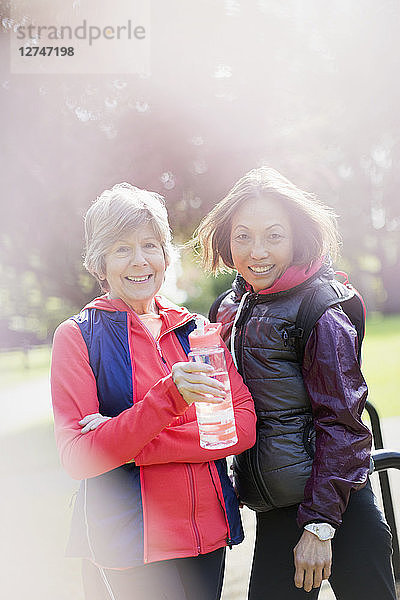 Portrait smiling  confident active senior women in park