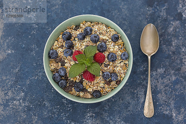 Bowl of muesli with raspberries and blueberries