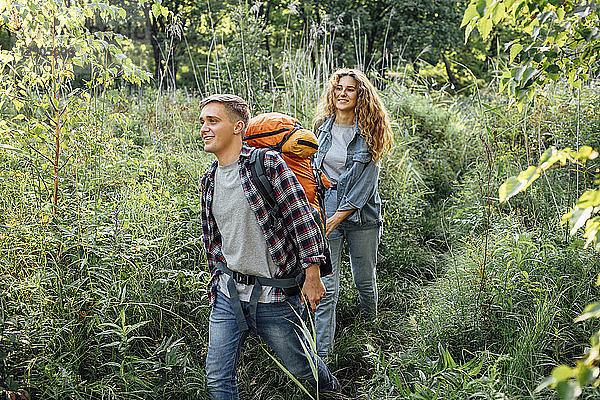 Young couple hiking together in nature