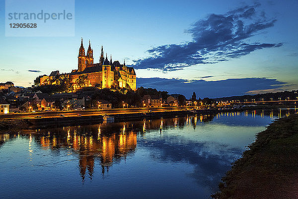 Germany  Meissen  view to lighted Albrechtsburg castle with Elbe River in the foreground