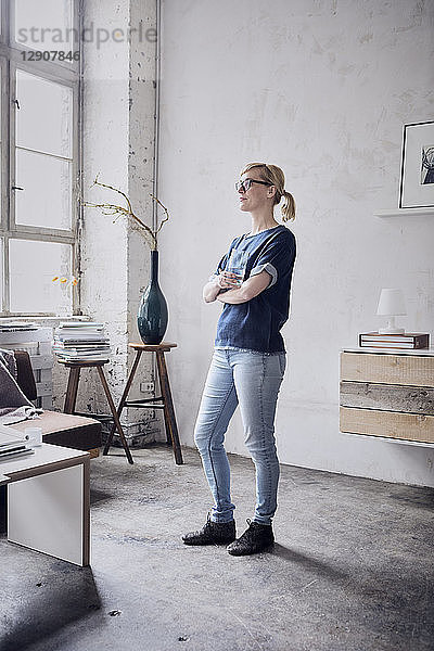 Woman standing in a loft