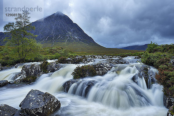 United Kingdom  Scotland  Glencoe  Highlands  Glen Coe  Coupall Falls of River Coupall with mountain Buachaille Etive Mor in background