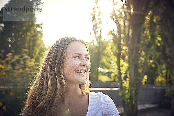 Portrait of a smiling  pretty woman in summer