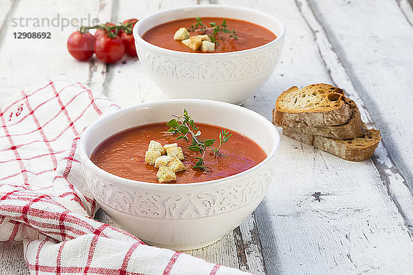 Mediterran tomato soup with roasted bread  croutons and thyme