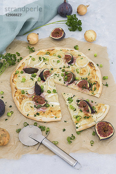 Homemade Tarte Flambee with figs  spring onions and goat cheese