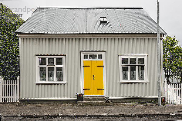 Iceland  Reykjavík  house with yellow door