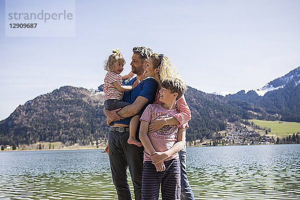 Austria  Tyrol  Walchsee  happy family at the lake