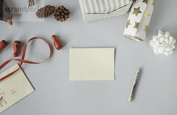 Writing Christmas cards and wrapping Christmas presents