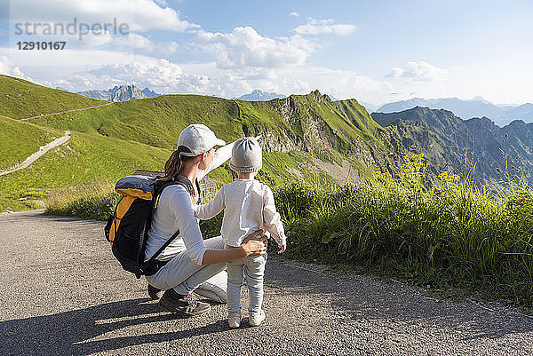 Germany  Bavaria  Oberstdorf  mother and little daughter on a hike in the mountains