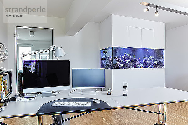 Interior of a modern office with aquarium