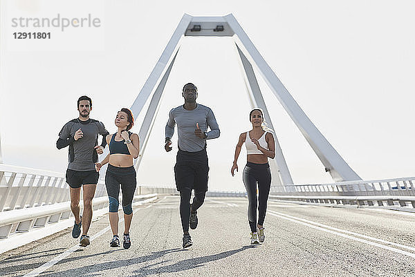 Group of sportspeople jogging