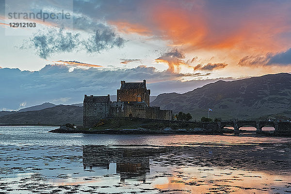 UK  Scotland  Dornie  Loch Duich  Eilean Donan Castle at sunset