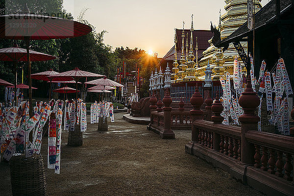 Thailand  Chiang Mai  Sunset with decorations to celebrate the New Year at the Wat Phan Tao Buddhist temple