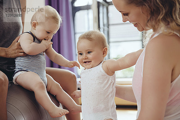 Mothers and babies in exercise room