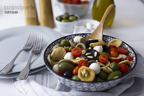 Mediterranean orecchiette with tomato  olives  mozzarella