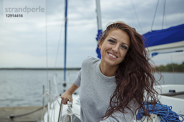 Portrait of woman  having fun on a sailing boat