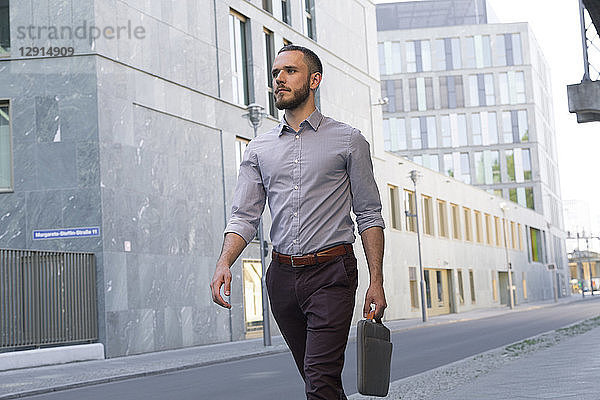 Businessman walking in the city