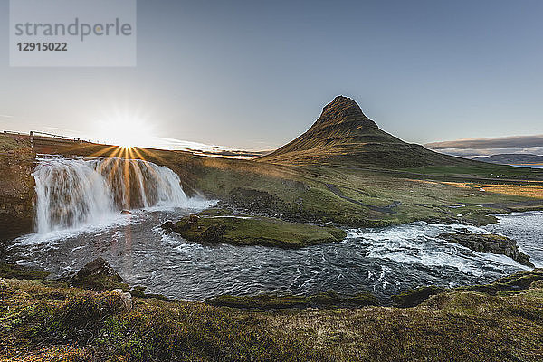 Iceland  Snaefellsnes  Kirkjufell  Kirkjufellsfoss waterfall at sunset