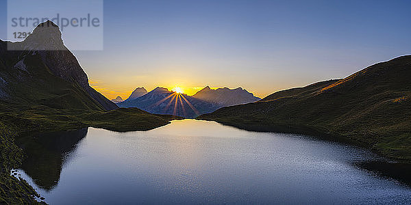 Germany  Bavaria  Allgaeu  Allgaeu Alps  Lake Rappensee  Kleiner Rappenkopf at sunset