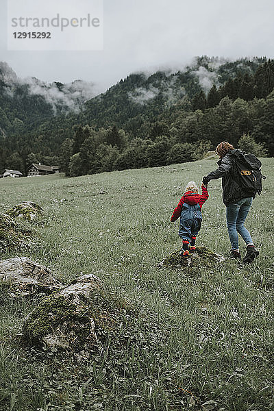 Austria  Vorarlberg  Mellau  mother and toddler on a trip in the mountains