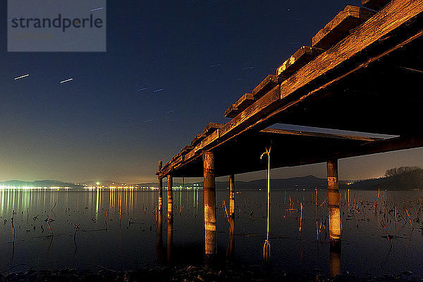 Italy  Piedmont  jetty at Lago Viverone at night