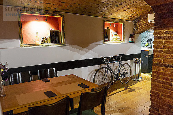 Interior of a restaurant with bicycle inside