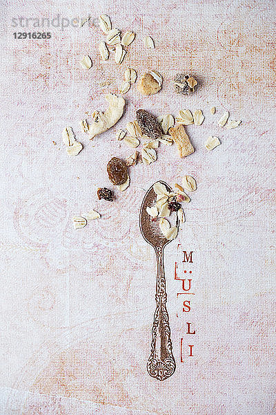 Stamped spoon and ornament with scattered granola