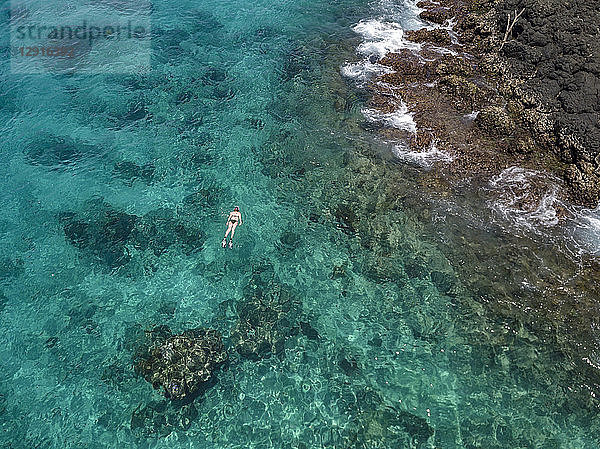 Indonesia  Bali  Aerial view of Blue Lagoon  snorkeler