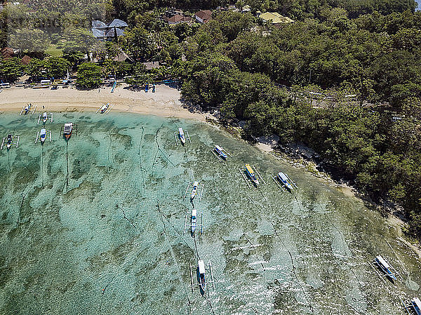 Indonesia  Bali  Aerial view of Padangbai  bay  beach  banca boats