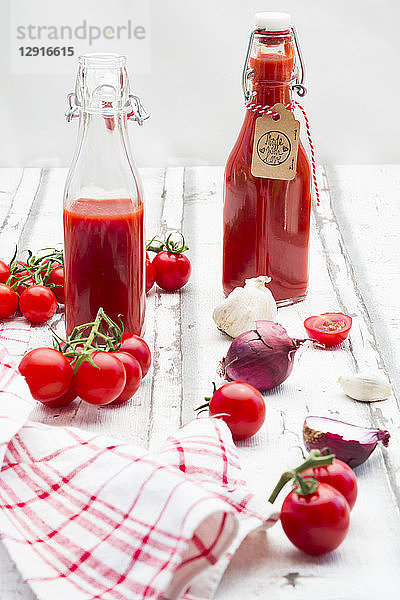 Homemade tomato ketchup and ingredients