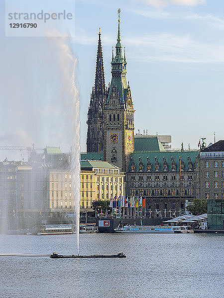Germany  Hamburg  city hall and St Nikolai Memorial with Inner Alster and Alster fountain in the foreground