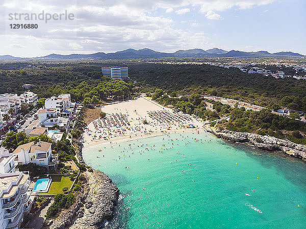Spain  Mallorca  Portocolom  Aerial view of Punta des Jonc  Bay of Cala Marcal  beach with tourists
