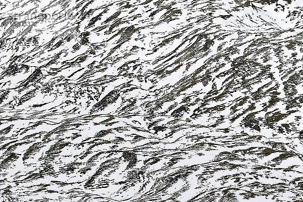 Verschneiter Berghang  reliefartige Ansicht  Hintergrundbild  Nationalpark Hohe Tauern  Kärnten  Österreich  Europa