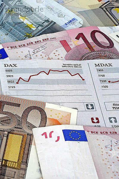 DAX  MDAX Aktienchart  Euro-Banknoten  Papiergeld  Symbolbild für Börsengewinne  Börsenverluste