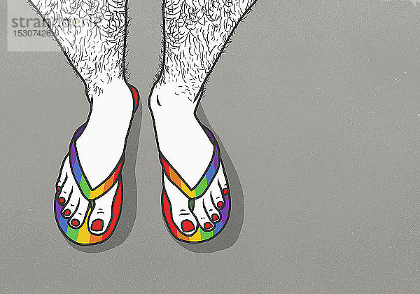 Mann mit behaarten Beinen und lackierten Zehennägeln in Regenbogen-Flip-Flops