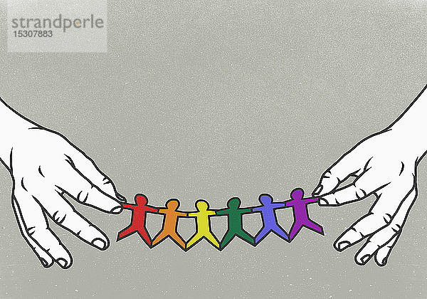 Hände halten LGBTQI-Regenbogen-Papierkette