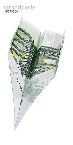 Papierflugzeug aus 100-Euro-Scheinen  Nahaufnahme