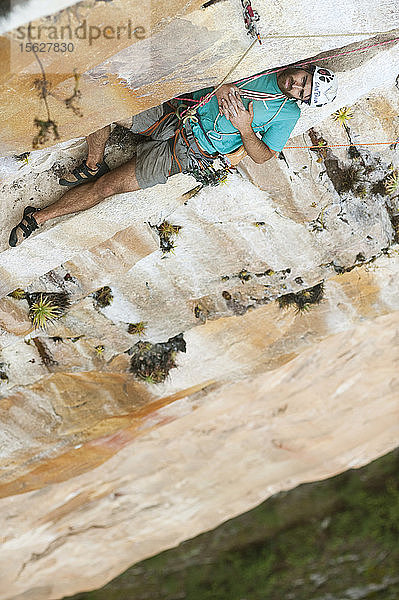 High Angle View Of Man Relaxing On Edge Of The Rocky Mountain  Bolivar State  Venezuela